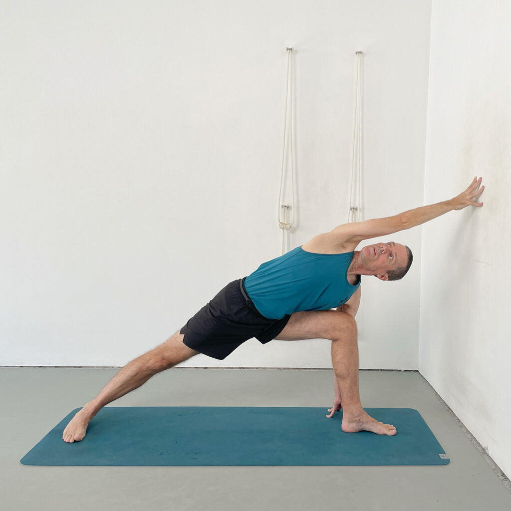 Parsvakonasana with Top Hand to the Wall
