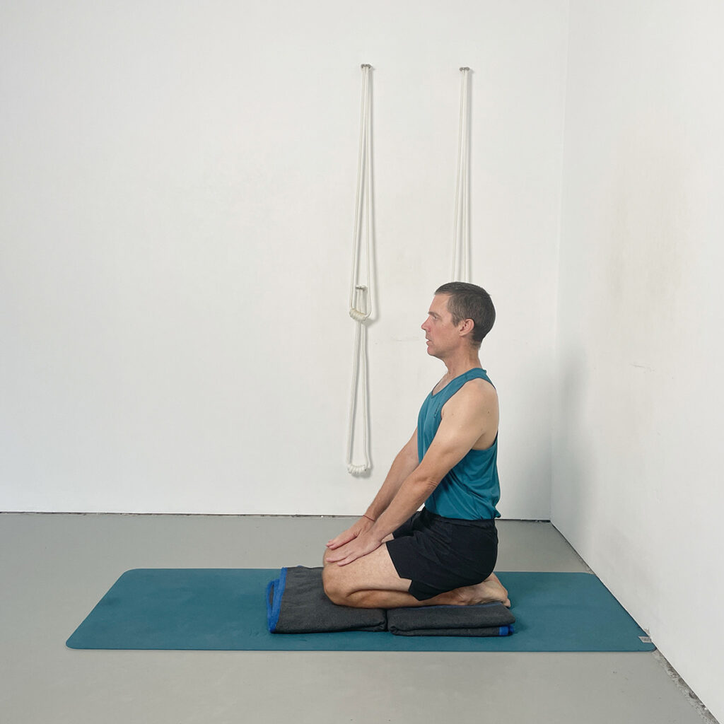 vajarasana with toes off the blanket