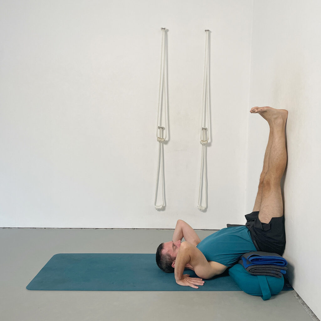 viparita karani forward roll for experienced students
